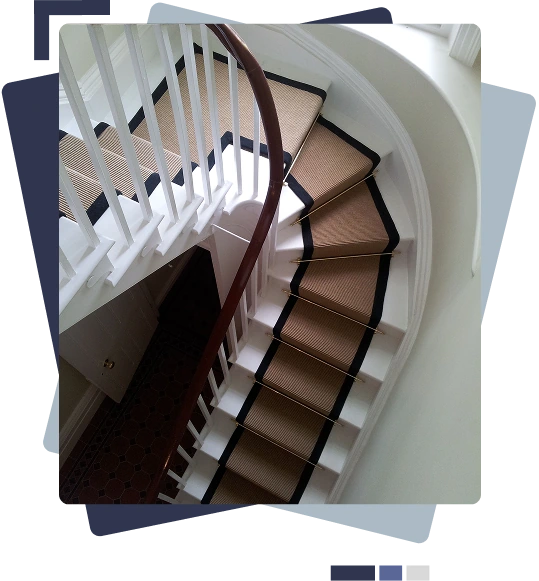 Curved staircase with beige carpet runner