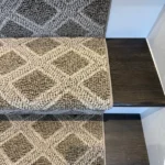 Edge of textured geometric runner on dark wood step