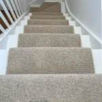 Loop-pile __Wool Snug stair runner__ with a cream whipped edge.