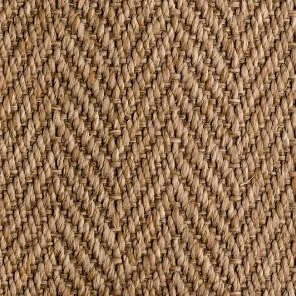 Tan sisal rug in a herringbone pattern