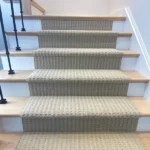 Straight-on view of a neutral patterned stair runner