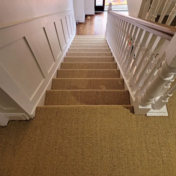 Tan sisal carpet covering staircase